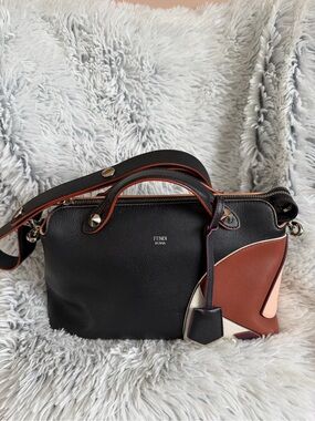 Pre-loved authentic Fendi Black with Brown & Cream Panels.